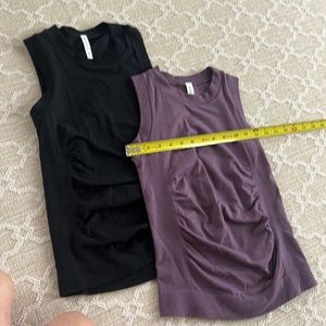 (Fits a Small). Athleta 2 tops stretchy soft worn once XXs fits size 32-34 B-D
